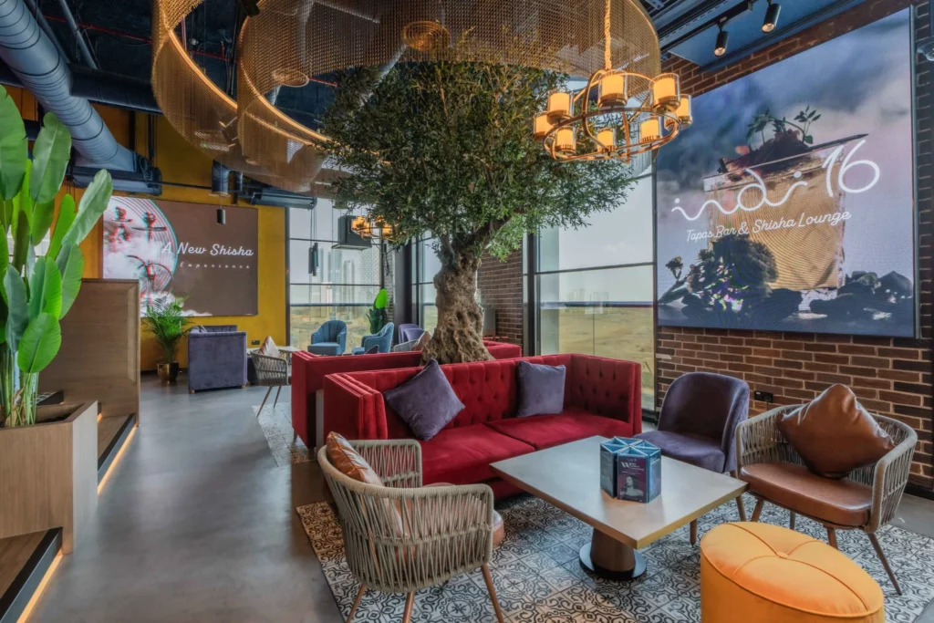 Custom made faux trees with natural trunk for malls in uae