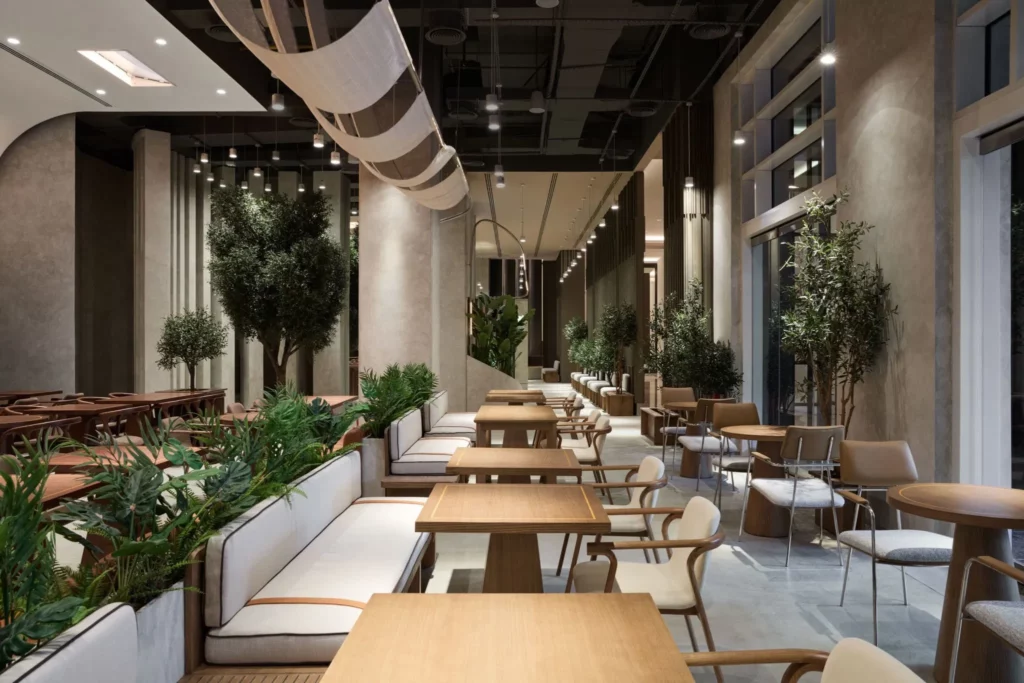 Luxury artificial indoor plants Riyadh – sleek greenery supplied by top artificial plants suppliers in Saudi Arabia for an upscale restaurant.