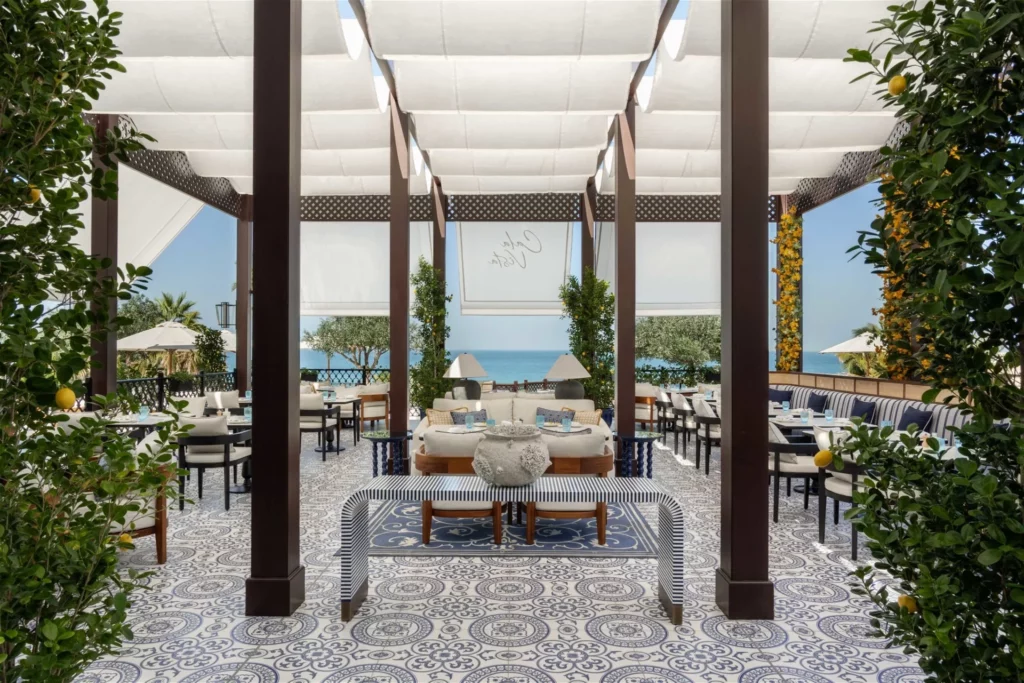 Elegant outdoor restaurant decorated with sun-resistant plants in Saudi Arabia